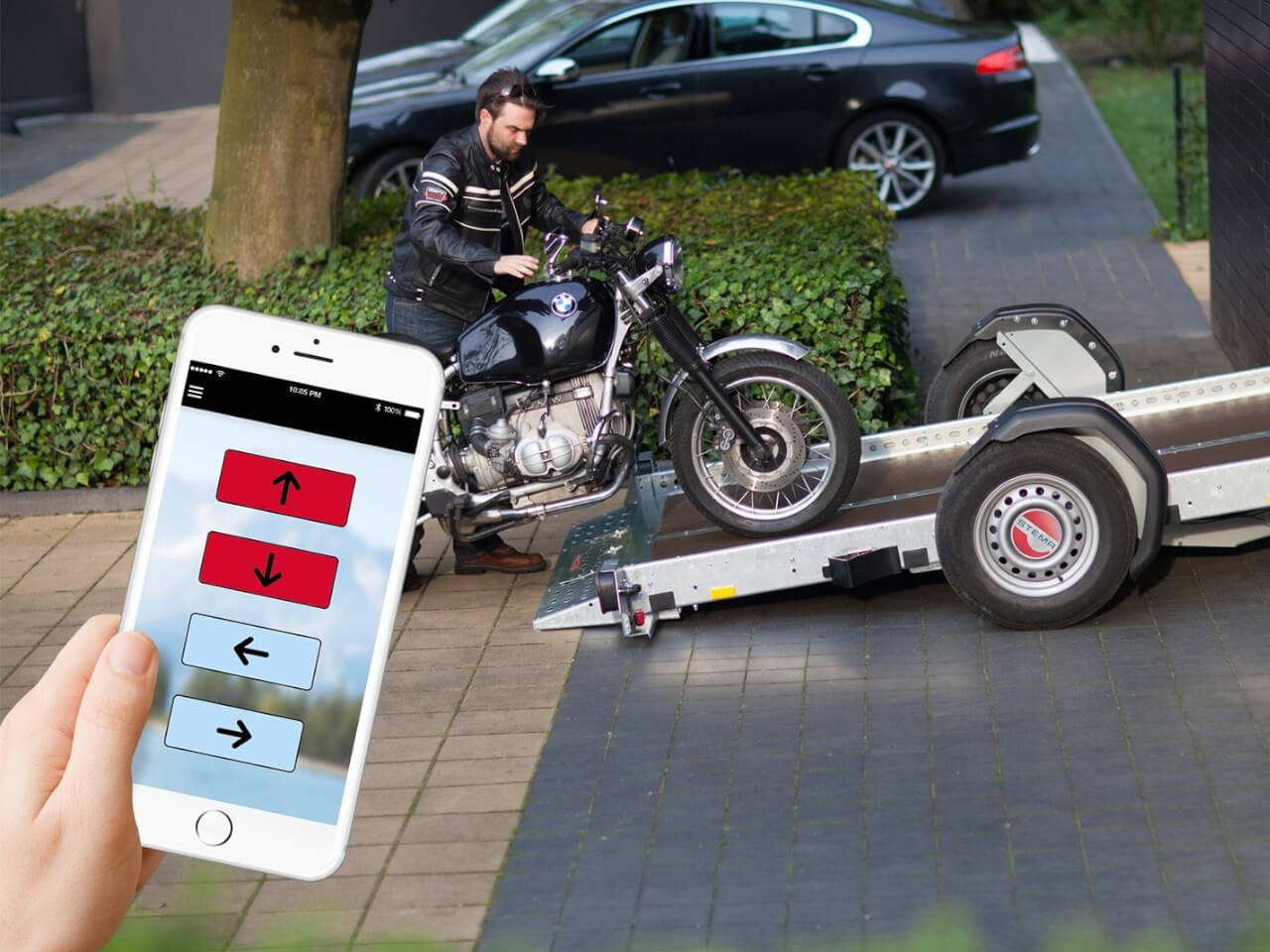 elektrische fernbedienung per app fuer den absenkbaren anhaenger wom von stema